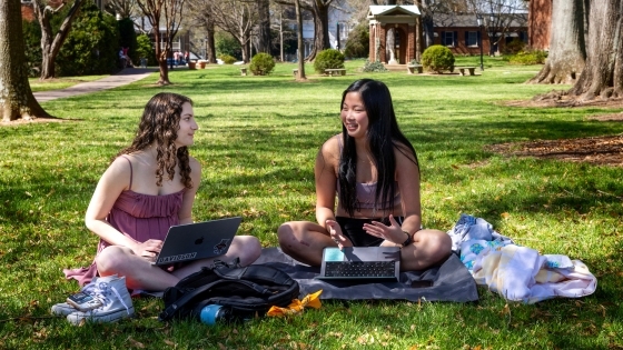 Students hanging out with laptops