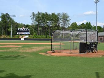 Wilson field showing the score board and batting practice equipment