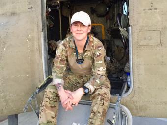 Chief Warrant Officer 3 Emily King ’09 aboard her Chinook helicopter in eastern Afghanistan