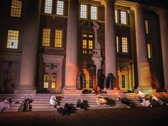 Students act out a zombie scene on Chambers steps