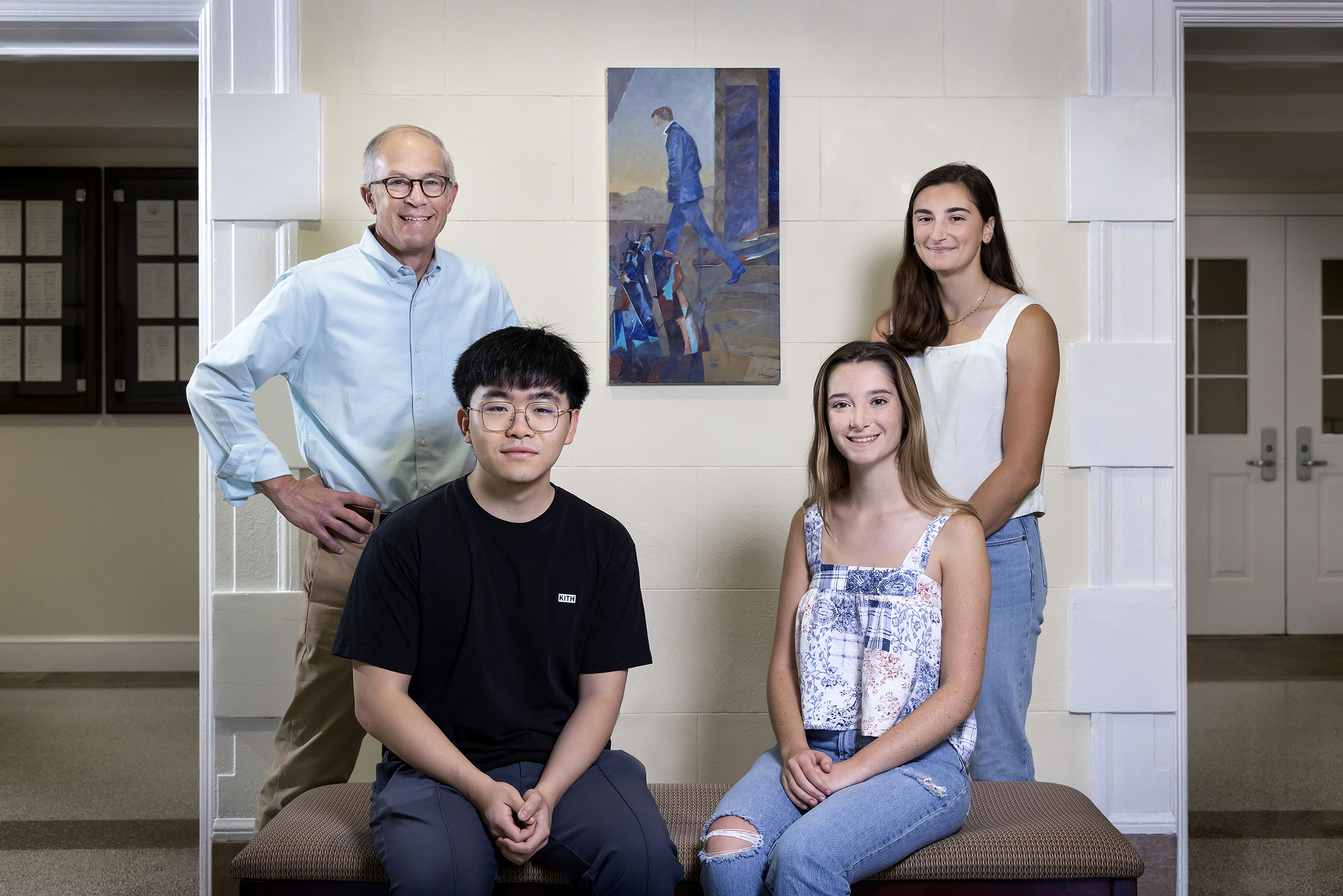 Biology Professor Dave Wessner with students David Peng '22 and Cathleen Krabak '23 (seated) and Nella Tsudis '23, surrounding “El Extranjero” by artist Delia Cugat.