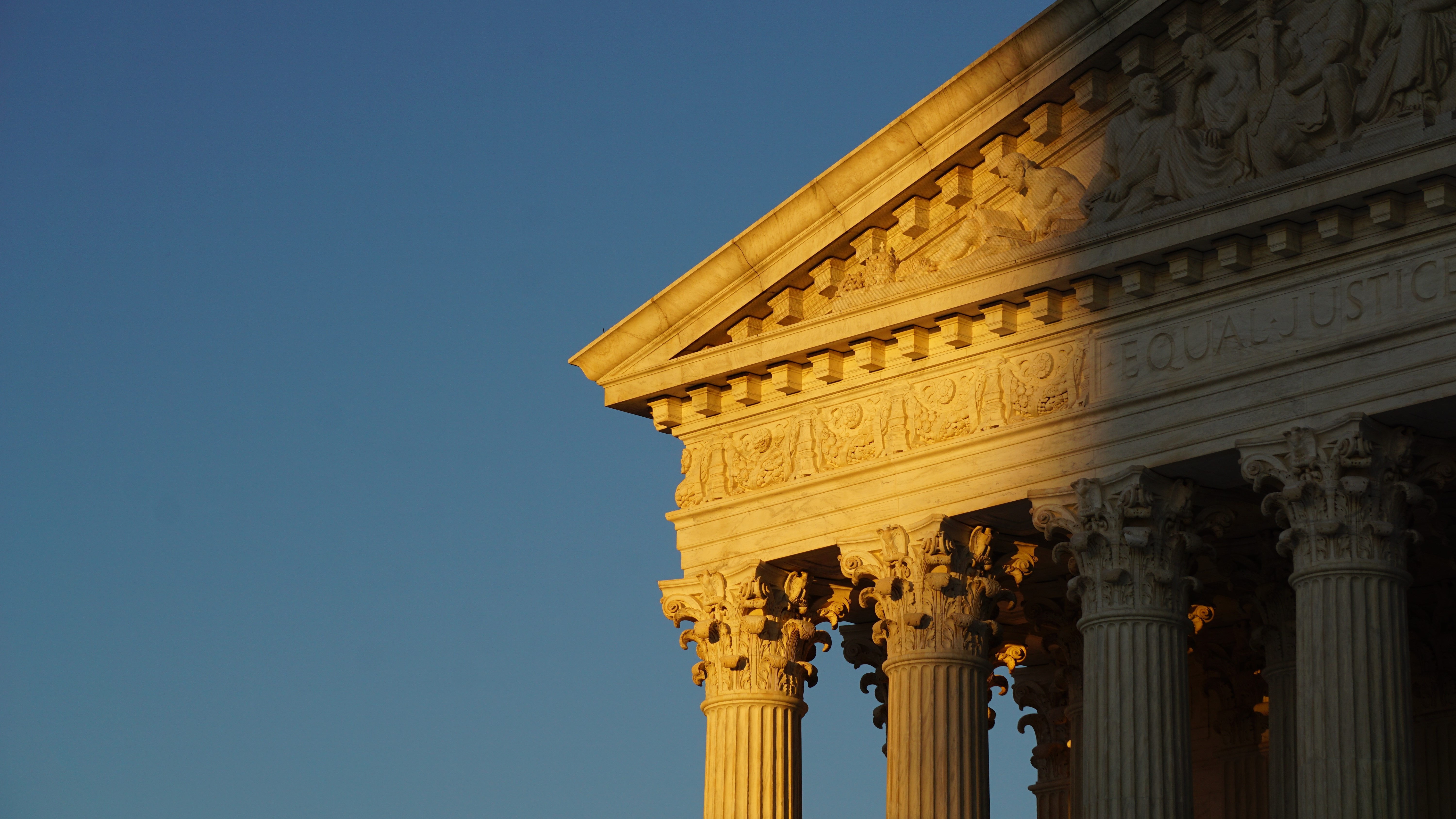 Shadow cast over the top of the US Supreme Courthouse