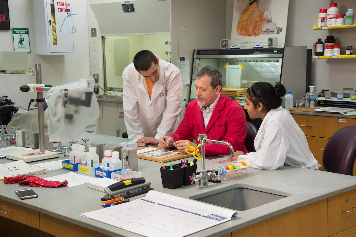 Julio Ramirez working in lab