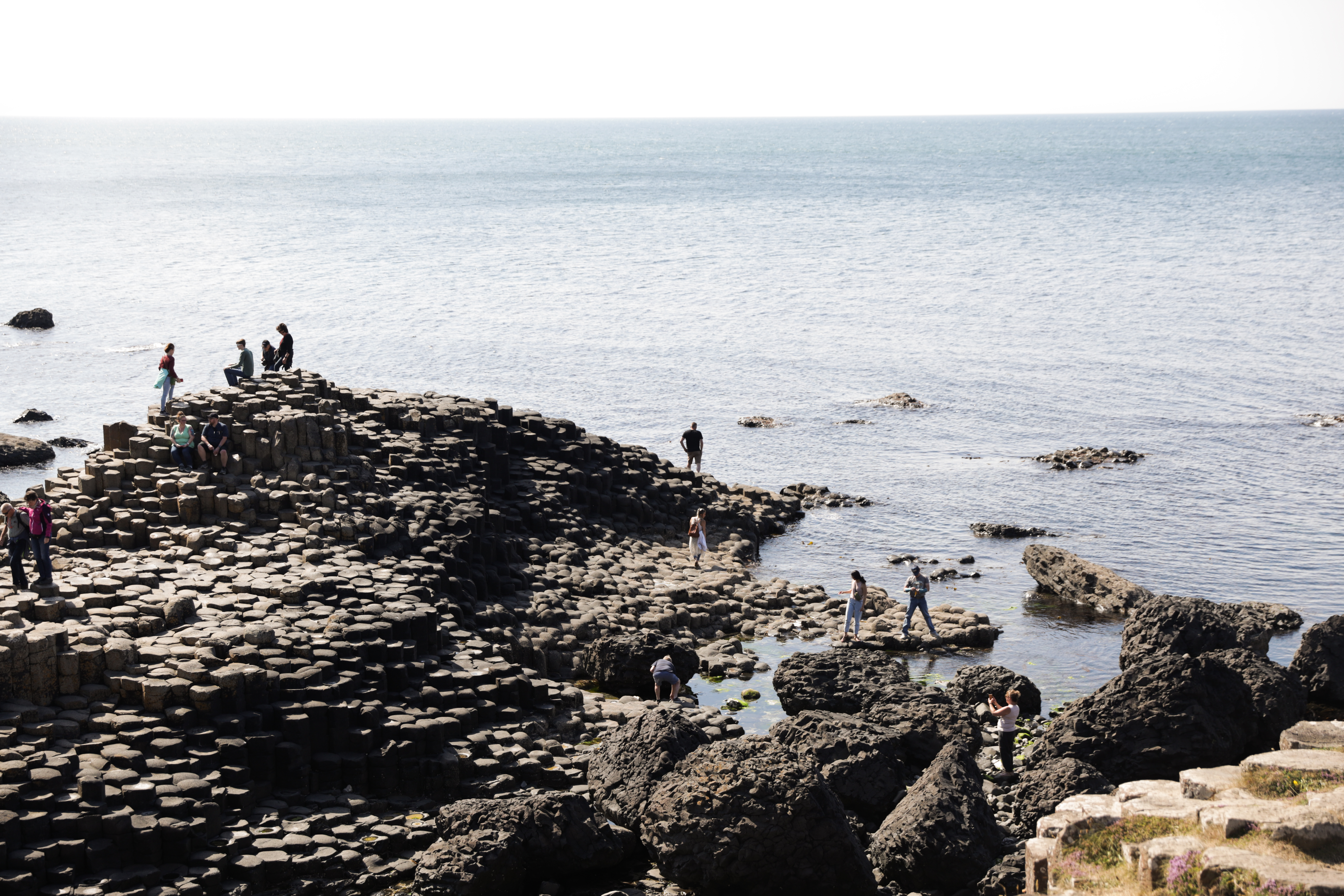 an ocean view of rocky cliffs