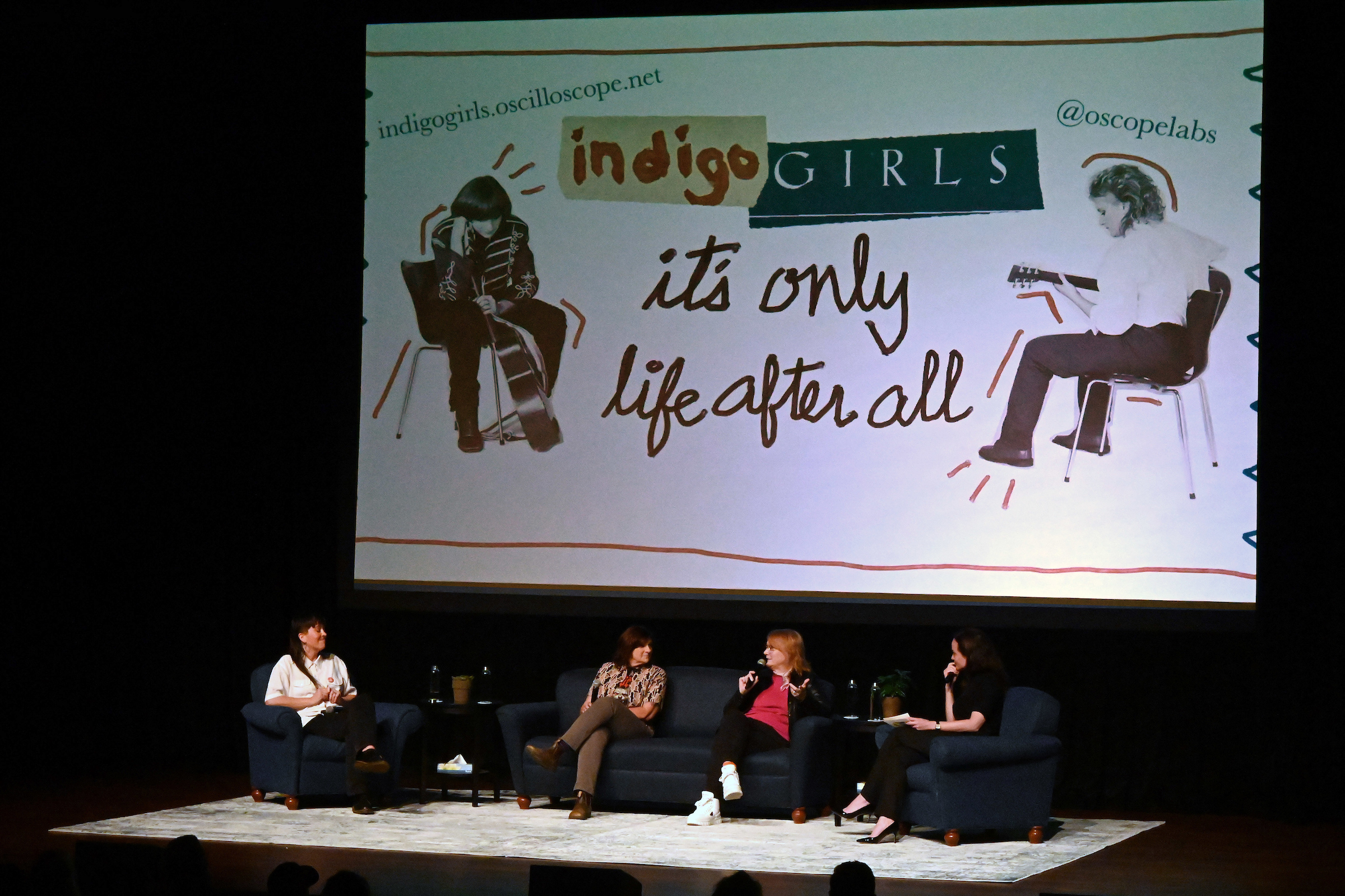 The Indigo Girls on stage at Davidson College 2024 with It's Only Life After All background