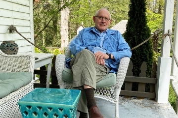 Charles Cornwell ’61 on house porch