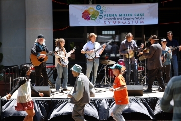 scenes of people dancing in front of a band