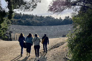 Davidson College students from thelasses 2024 and 2025 approach the Theatre at Epidaurus, Greece