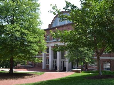 Outside of Alvarez College Union through trees