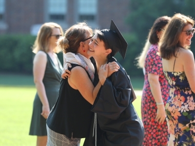 Student Hugs Family Member