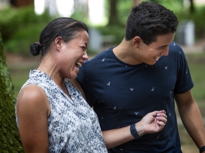 Student with Family Member Laughing