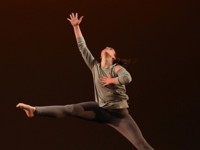 Dancers performing by leaping in air