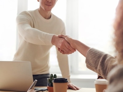 two people shaking hands