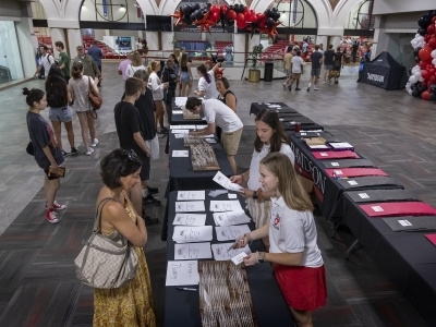 Parents meet with staff at Orientation Fair 2022