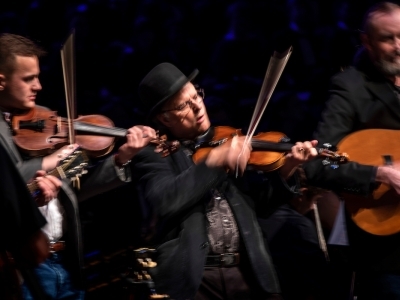 appalachian ensemble of three men playing string instruments