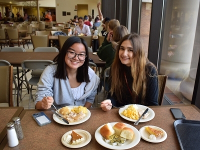 Two students enjoying lunch at Vail Commons