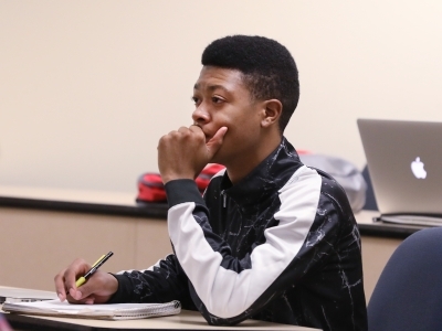 Student Takes Notes During FEC Visit