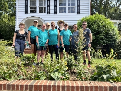 Sustainability team working on pollinator garden