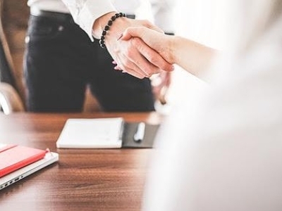 two people shaking hands