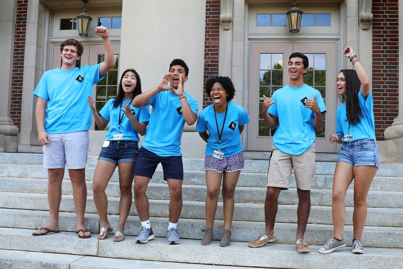 July Experience members at the steps of Chambers celebrating