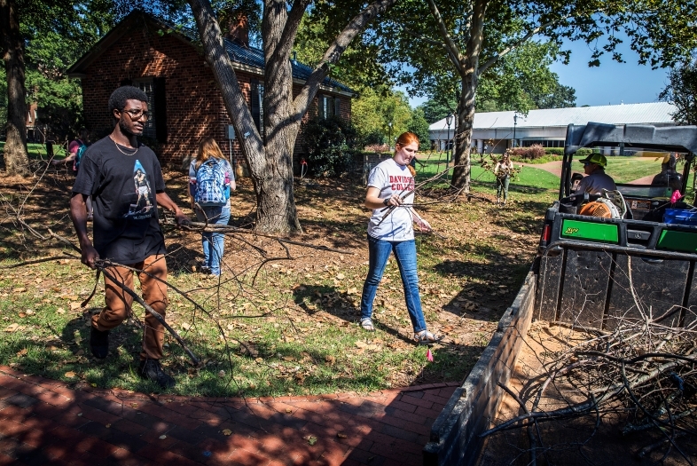 Campus cleanup where student help college landscaping after a hurricane