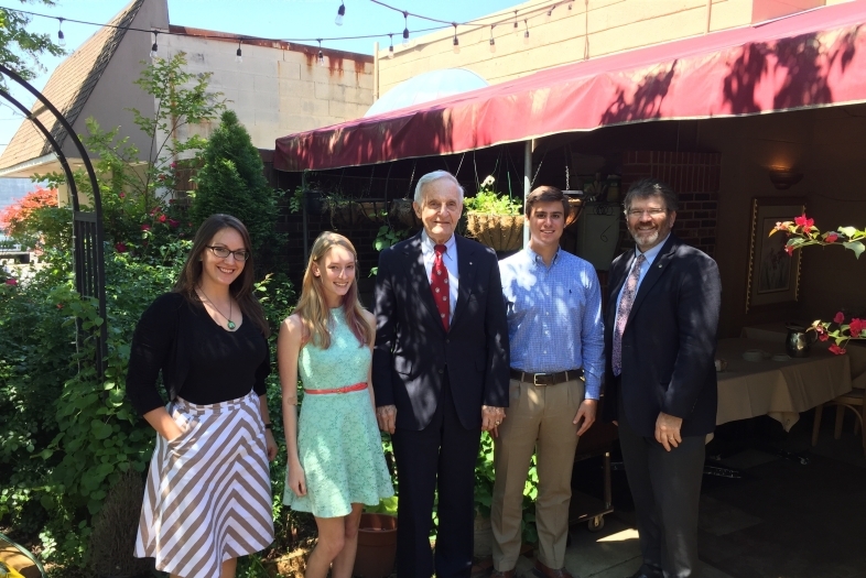 Bremmer poses with students and faculty from Davidson