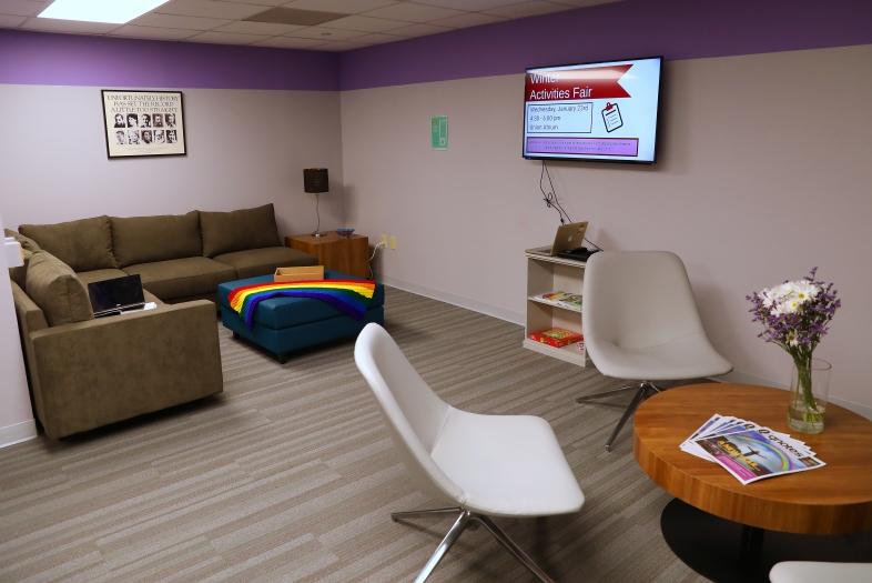 Photo of Lavender Lounge with purple walls and modern furniture