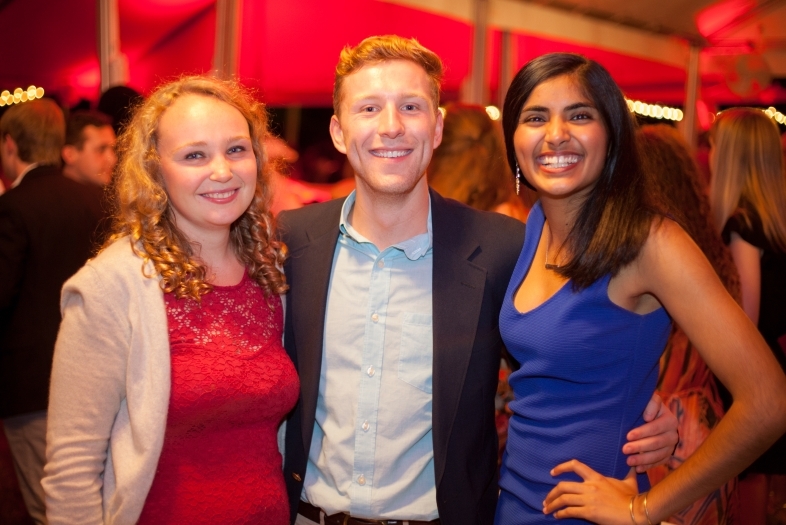 Young Alumni Group Pose at Event