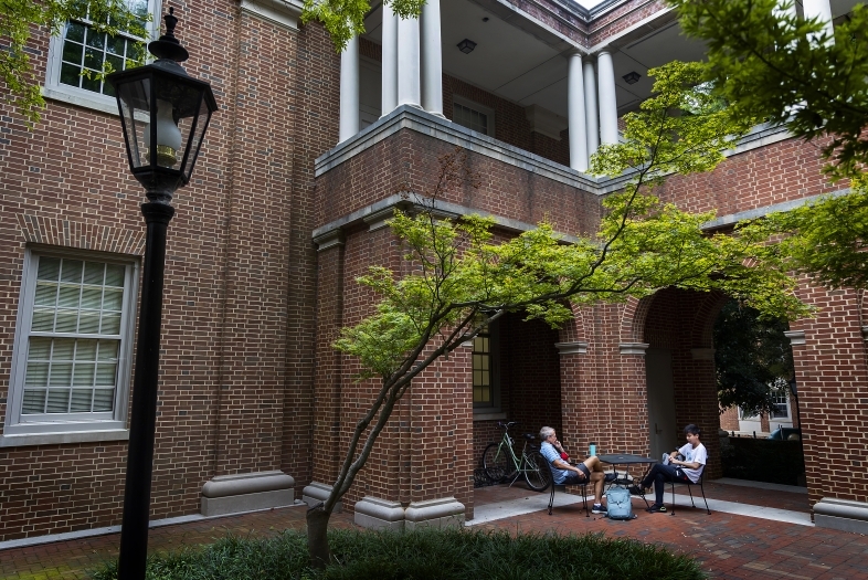 Prof. Dave Martin and Student Meeting Outside