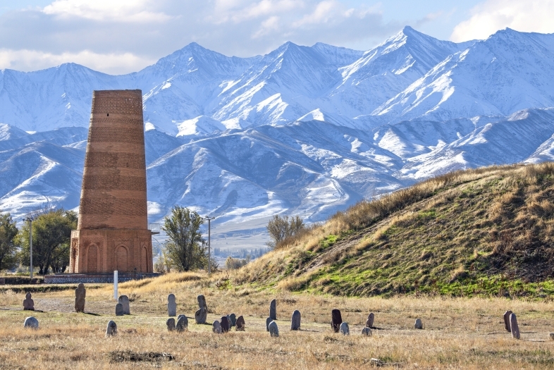 Ancient site of Burana with old minaret and tombstones known as Balbas in Kyrgyzstan