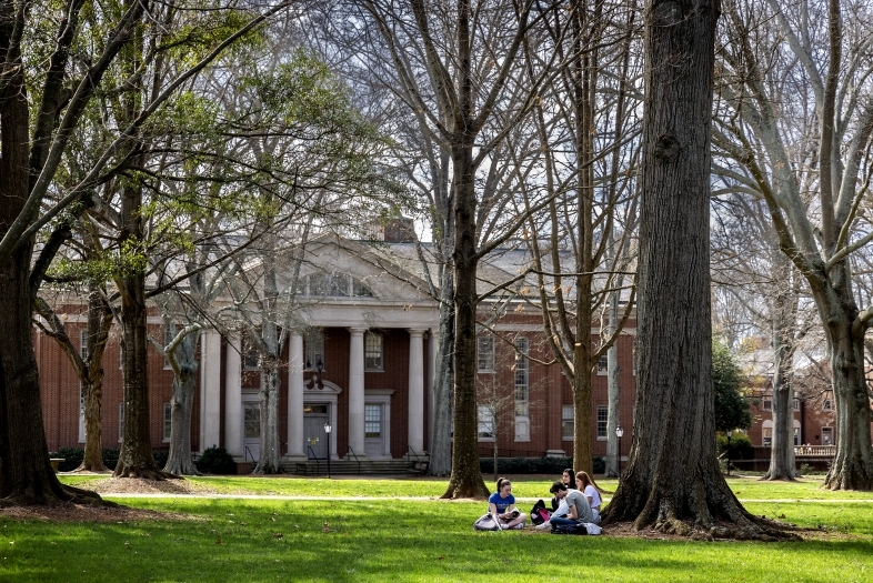 Students studying outside Baker-Watt Complex