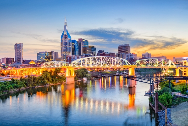 River, bridge and skyscrapers of Nashville, Tennessee at sunset