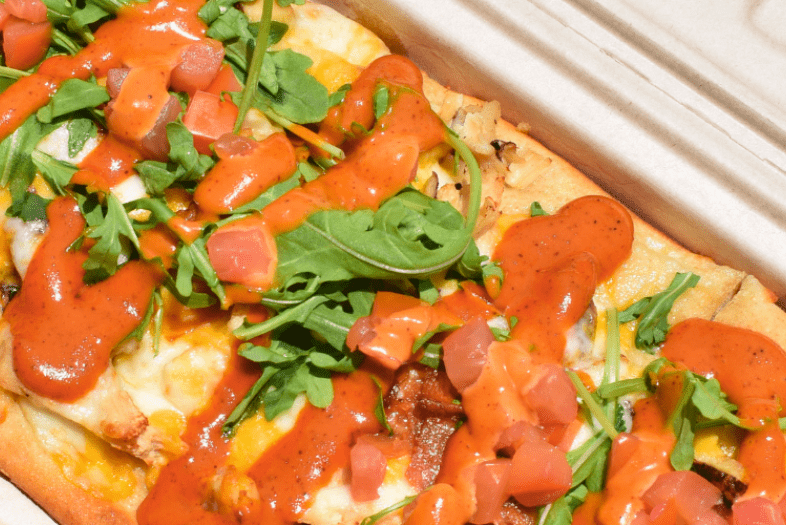 Davis Cafe Flatbread in a to-go box