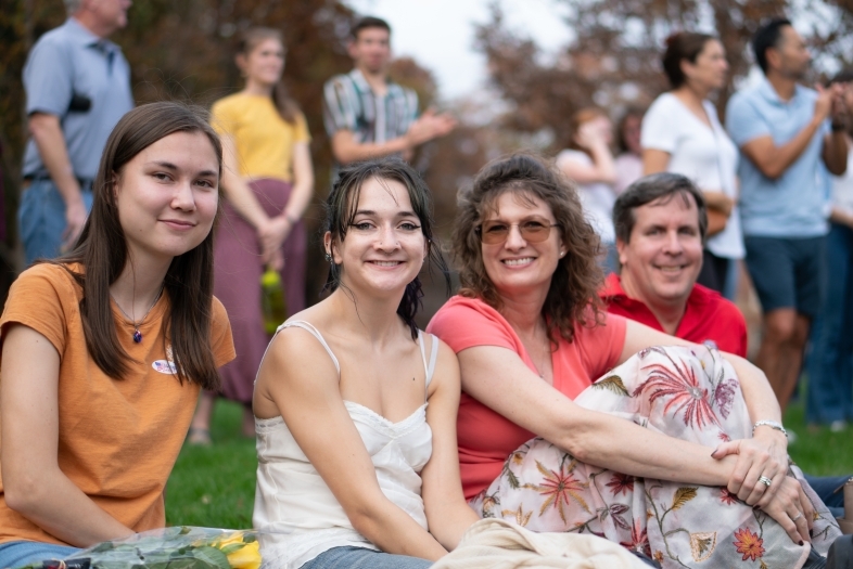 family sitting together at Wildcat Weekend