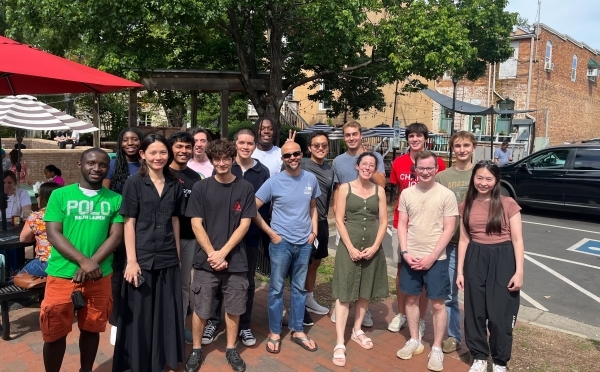 Student researchers outdoors with Professors