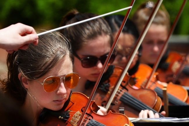 Verna Case Symposium Students Playing Violins