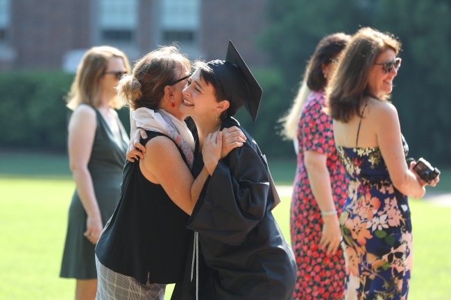 Student Hugs Family Member