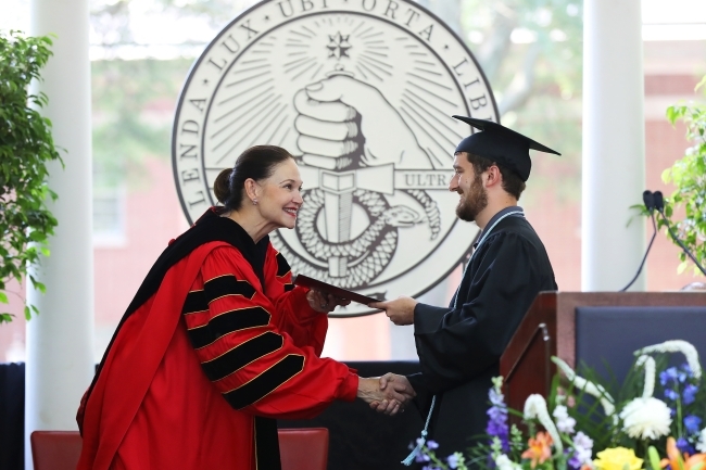 Student Shakes Pres. Quillen's Hand