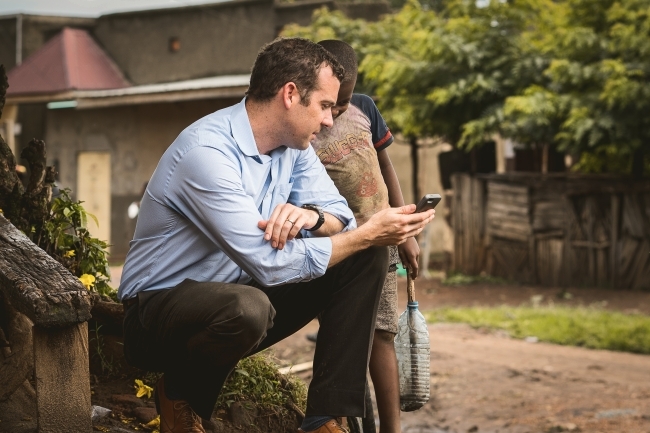 Ross Boyce Showing Cell Phone