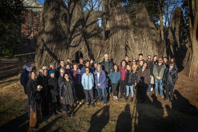 Team in front of Patrick Dougherty Sculpture