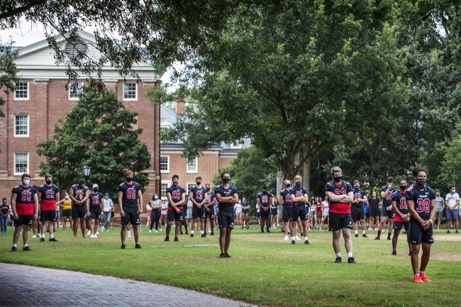 Social Justice Event - Football Team on the Green