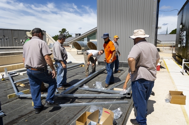 construction on the roof of Wall Center for the greenhouse