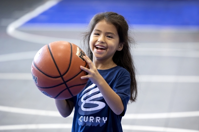 Girl holding a basketball