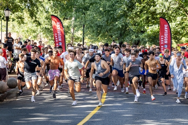 Davidson’s track and field team runners usually take the (first) cakes and this year was no different. Cross Country runner John Cooper ’27 won first place in the men’s race. Six Class of 2027 teammates, Katie Deacon, Bella Godoy, Jocelyn Millican, Amelia Monohan, Hannah Morgan, Elise Boyce and Justine Meta led the women, crossing the finish line clasping arms.  More From Welcome Week