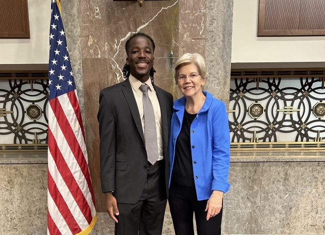 Nathanael Bagonza ’24 and Elizabeth Warren