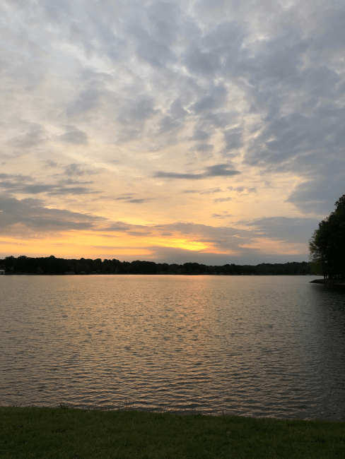 a sunset over a lake