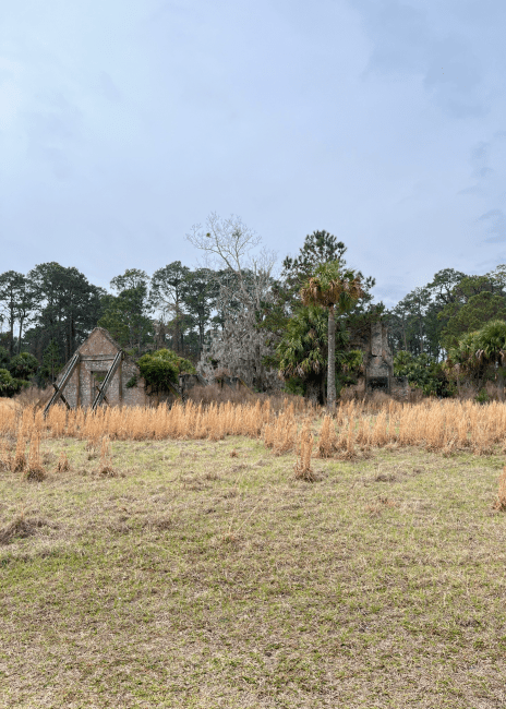 remnants of a wooden building on an island