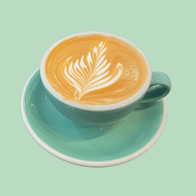 Cappuccino on green saucer