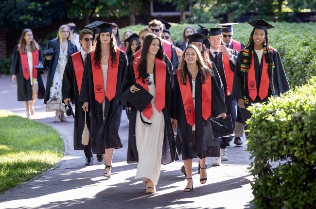 a group of students in graduation robes