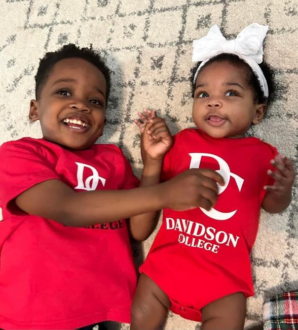 Children of Morgan Bell Kee ’12 and Harvey Kee ’11 wearing Davidson gear